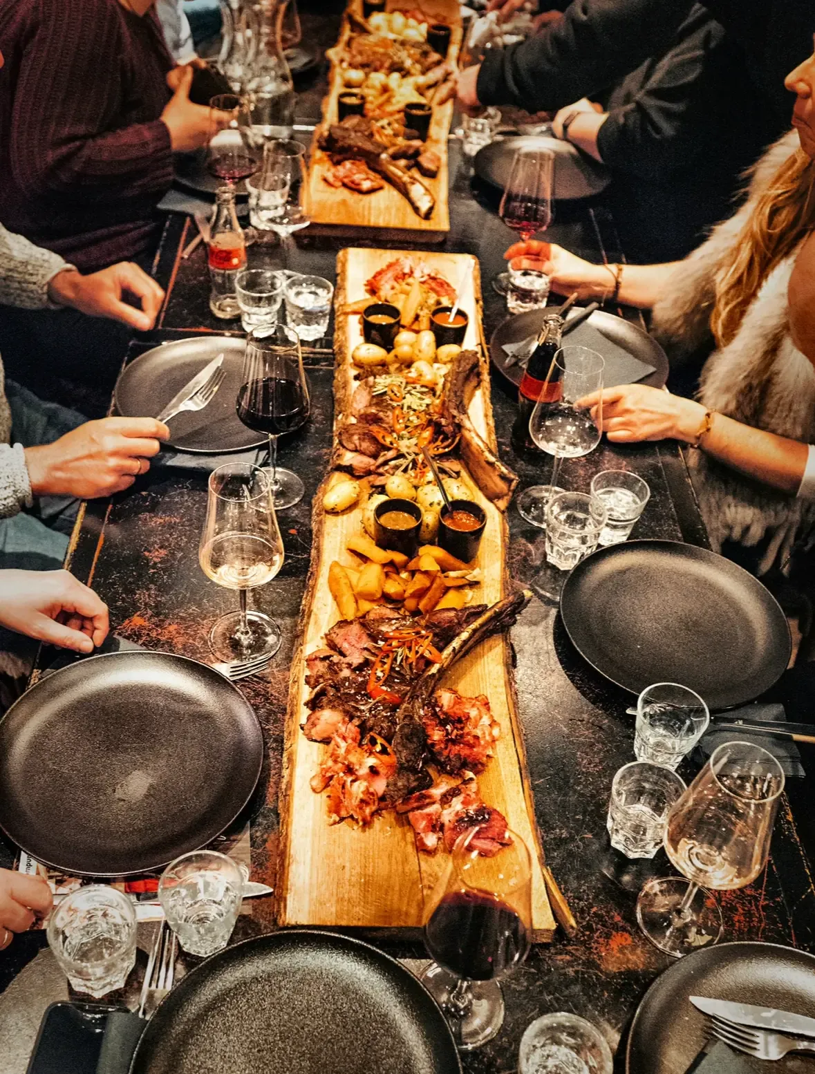 Wild Scandinavian Cooking with Brian Bojsen – sharing dinner at long tables cooked over an open fire at the Greenvieh in Mieming, Tyrol